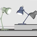 Modern Adjustable Arm Desk Lamps in Green Blue Gray on White Surface
