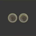 Pair of Round Concrete Manhole Covers With Detailed Decorative Surface Patterns