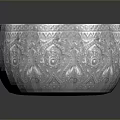 Intricate Carved Silver Bowl Sculpture With Detailed Patterns And Reflective Surface
