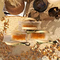 Elegant White Gift Bags With Gold Glitter Bows In Decorative Setting and Floral Arrangements