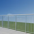 Outdoor Silver Metal Railing with Blue Sky Green Grass and Tile Floor