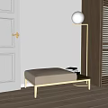 Stylish Ottoman with Cream Cushion and Golden Metal Legs by Floor Lamp and Wooden Shutters