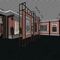 Cultural Center Interior With Traditional Paintings On Black Metal Display Stands And Red Walls