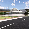 Modern Landmark Building With Unique Curved Roof Near Road Green Area Trees Mountains And Blue Sky