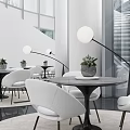 Modern Hotel Public Lounge Area With White Chairs Round Tables Floor Lamps And Potted Plants