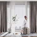Elegant Velvet Curtains with Sheer Panels by Window and Cozy Pouf Setup