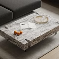 Marble Texture Coffee Table With Oranges Magazine Tray Glass And Grey Sofa