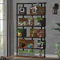 Wooden and Metal Shelving Unit Displaying Various Potted Plants and Decorative Items in Living Room