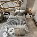 Modern Bedroom Interior With Gray Headboard Plaid Bedding Decorative Circles And Brown Armchair
