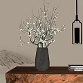 Gray Vase With White Flowered Branches On Wooden Table With Landscape Background And Hanging Lamp