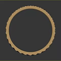 Golden Ring Shaped Household Item With Intricate Braided Surface Design