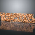 Golden Decorative Sculpture Carving With Intricate Floral Vine Leaf Patterns Shiny Surface On Black Background