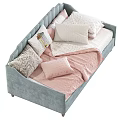 Gray and Blue Upholstered Toddler Beds with Decorative Pillows and Blankets