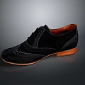 Elegant Black Leather Brogue Shoes With Intricate Carving And Brown Sole