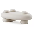 White Modern Coffee Table With Rounded Shapes And Unique Base Design