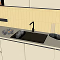 Stainless Steel Kitchen Sink with Brushed Faucet in Modern Kitchen on Beige Countertop and Glassware
