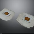 Delicious Two Freshly Baked Cookies Placed On White Paper Towels