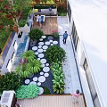 Serene Garden Landscape Featuring Circular Stone Pathway Wooden Deck And Lush Greenery