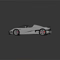 Silver Convertible Sports Car With Sleek Aerodynamic Design And Red Brake Calipers