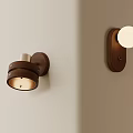 Brown Round Wall Lamps Mounted On Light Colored Wall Surface 3d model