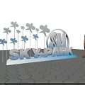 3D Lettering Sign SKY PARK With Butterfly Decorations Person Standing On Hexagonal Tiled Ground
