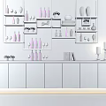 Elegant Wine Cabinet with Wine Bottles Glasses and Decorative Items on Gold Shelves