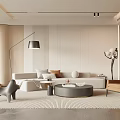 Modern Living Room With Light Sofa Round Coffee Table Floor Lamp And Accent Chair