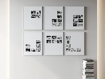 White Framed Black And White Photos Arranged On White Wall With Stacked Books 3d model