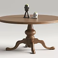 Round brown wooden dining table with decorative base and small items on top 3d model