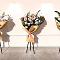 Floral Display With Paper Wrapped Bouquets Pink Ribbons And Tripod Stands
