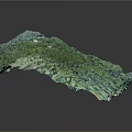 Lush Green Mountain Forest With Nestled Buildings And Dense Vegetation Aerial View