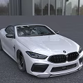 White BMW Convertible Sports Car With Black Top And Stylish Front Design