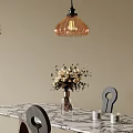 Modern Dining Table Set with Marble Top Curved Back Chairs Hanging Pendant Light Flower Vase
