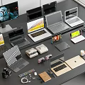 Various Laptop Models Desktop Monitors And Electronic Accessories On Office Desk