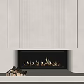 Modern Fireplace With Vertical Slat Design And Burning Flames Near Stacked Firewood