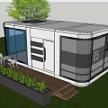 Modern Tiny Guesthouse With Large Glass Windows And Wooden Deck On Green Lawn