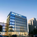 Ming Yuan Hotel Modern Glass Facade Building In Urban Blue Sky View