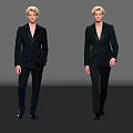 Two Male Models Wearing Black Suits Walking on Runway Against Gray Background