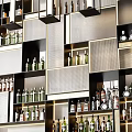 Modern Wine Cabinet With Multiple Shelves Various Wine Bottles And Hanging Lights