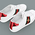 White Casual Sneakers With Red Green Stripes And Bee Emblem Design