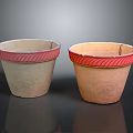Two Terracotta Garden Decor Pots With Red Wavy Rim Design Details