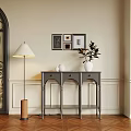 Gray Console Table Side Cabinet Decorative Frames Green Plant Vase Floor Lamp on Elegant Wall