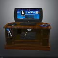 Entertainment TV Stand Setup With TV Game Controller Console And Blu ray Discs