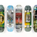 Five Skateboard Decks With Diverse Creative Graphic Art And Design Prints