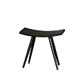 Sleek Modern Black Stool Design With Curved Seat And Three Legs