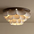 Elegant Petal Shaped Ceiling Light With White Lampshades Dark Frame And Warm Light Illuminating Room