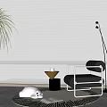 Modern Black Accent Chair in Living Space With Floor Lamp Side Table Blinds and Plant