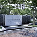Elegant Marble Feature Wall With Water Pool Greenery And Outdoor Seating Area 3d model