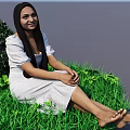 Woman In White Dress Sitting On Green Grass With Long Hair And Plants
