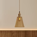 Classic Brass Pendant Light With Ribbed Beige Shade Hanging Above Wooden Surface Interior